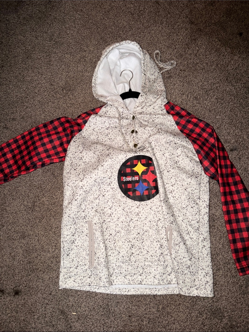 Woman’s Steelers dry fit button down hoodie